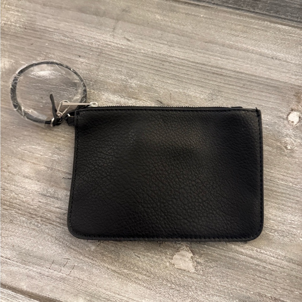 Street Level black small purse, wrist strap, one zip pocket